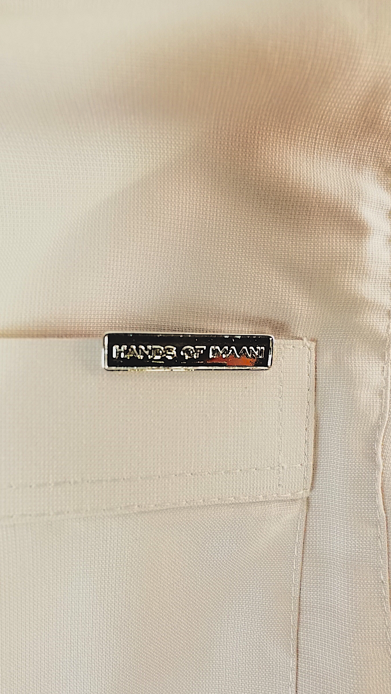 white thobe badge
